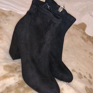 Brand New without tags. Black heel booties size 7